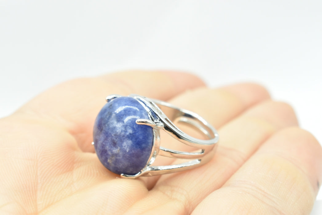 Ring with adjustable polished Sodalite