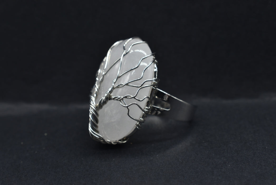 Ring with Oval Gemstone of Hyaline Quartz in platinum colored brass wire Adjustable