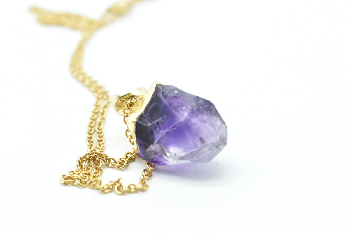 Raw Amethyst Point Pendant with gold-colored supports