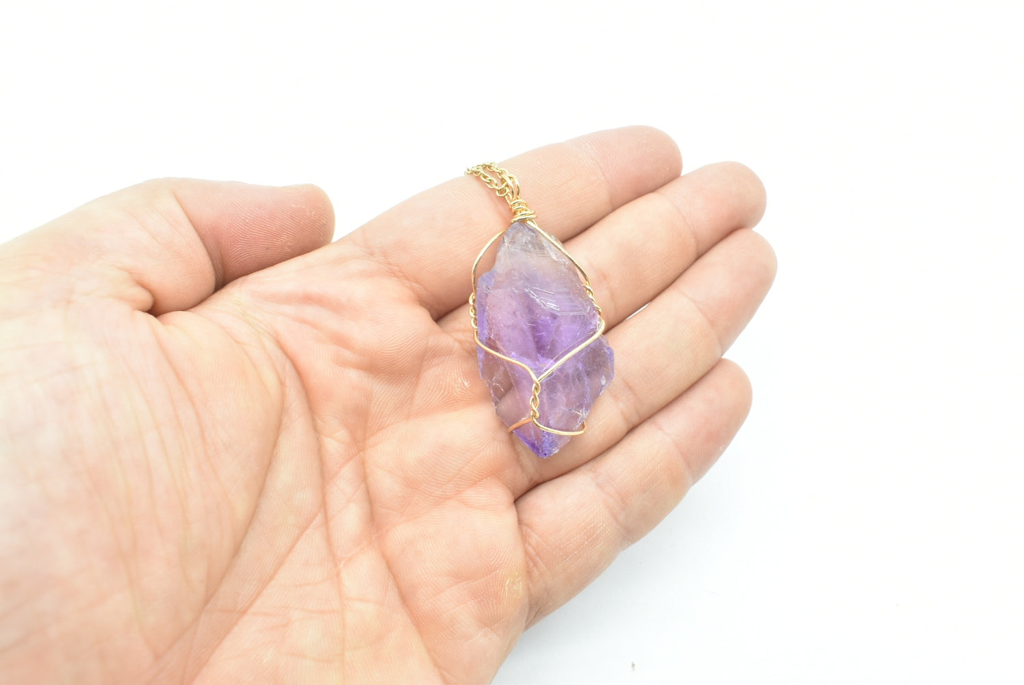 Raw Amethyst Pendant in brass wire