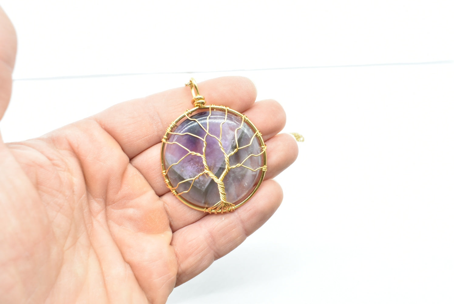 Amethyst plate pendant with tree of life symbol