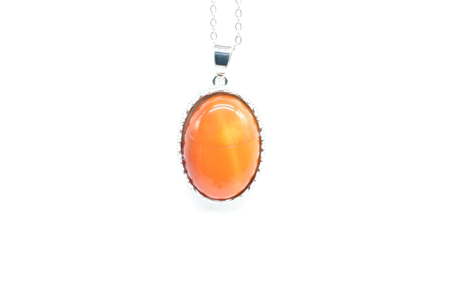 Oval Pendant of Dyed Orange Agate