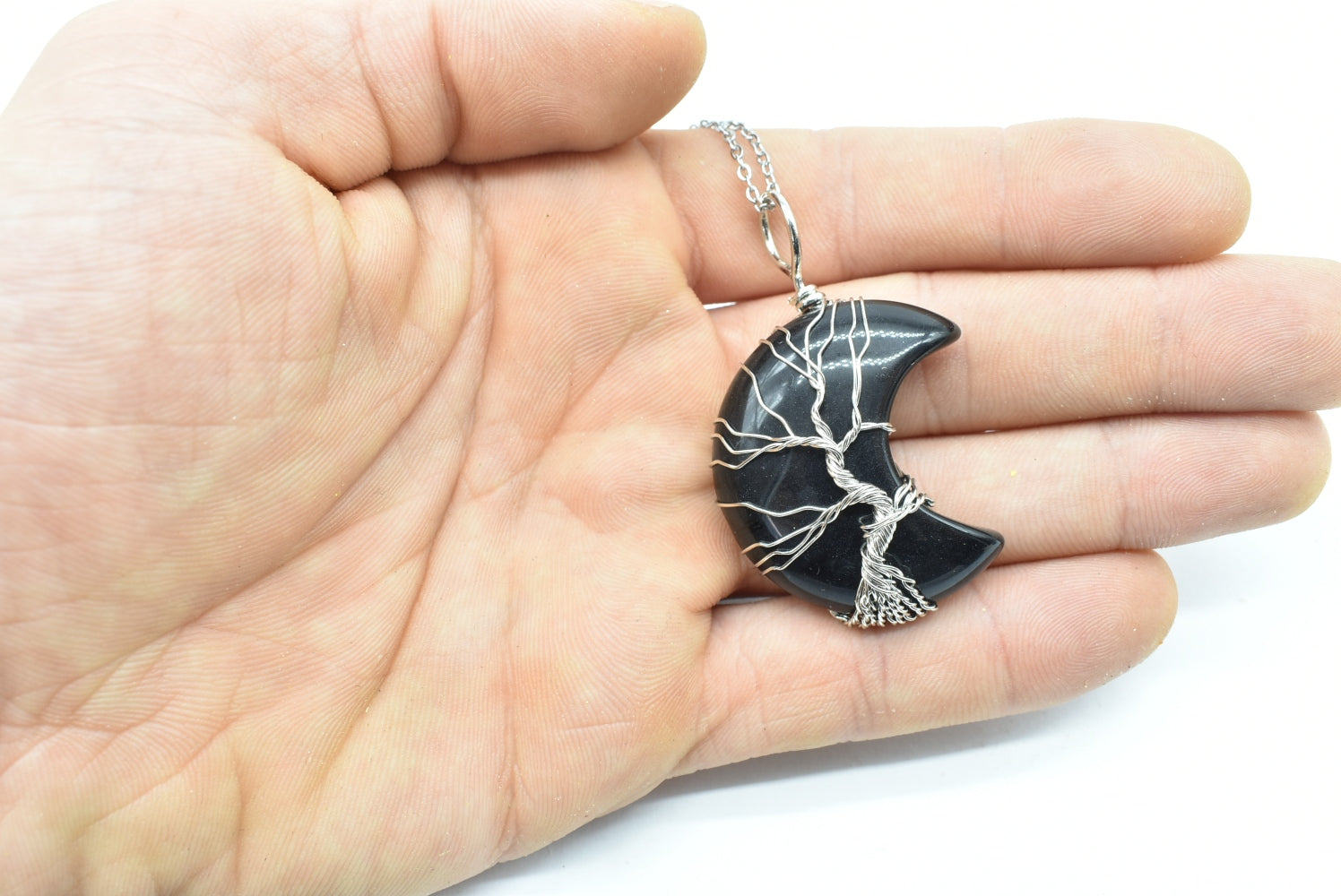 Obsidian Moon Pendant wrapped in silver colored wire