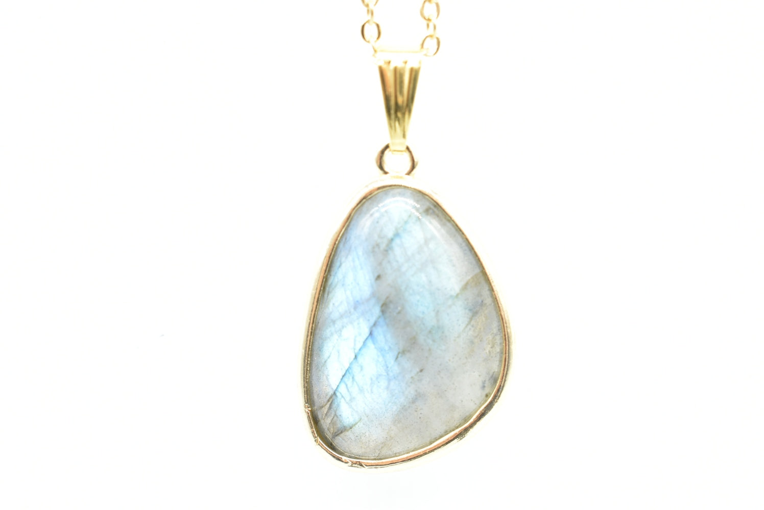 Labradorite teardrop pendant with gold-colored supports